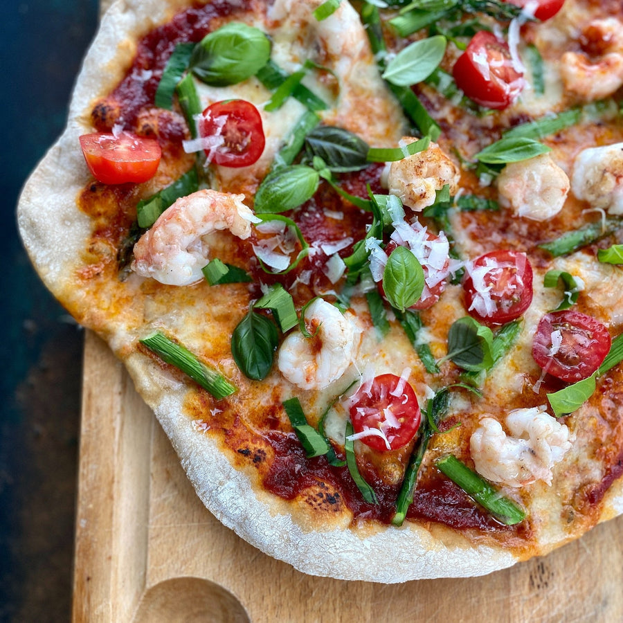 Pizza med jomfruhummer og grønne asparges